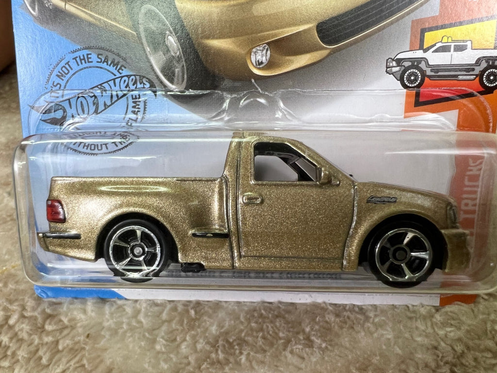 🇺🇸🇺🇸Hot Wheels HW Hot Trucks ‘99 Ford F-150 SVT Lightning Gold HW18🇺🇸🇺🇸