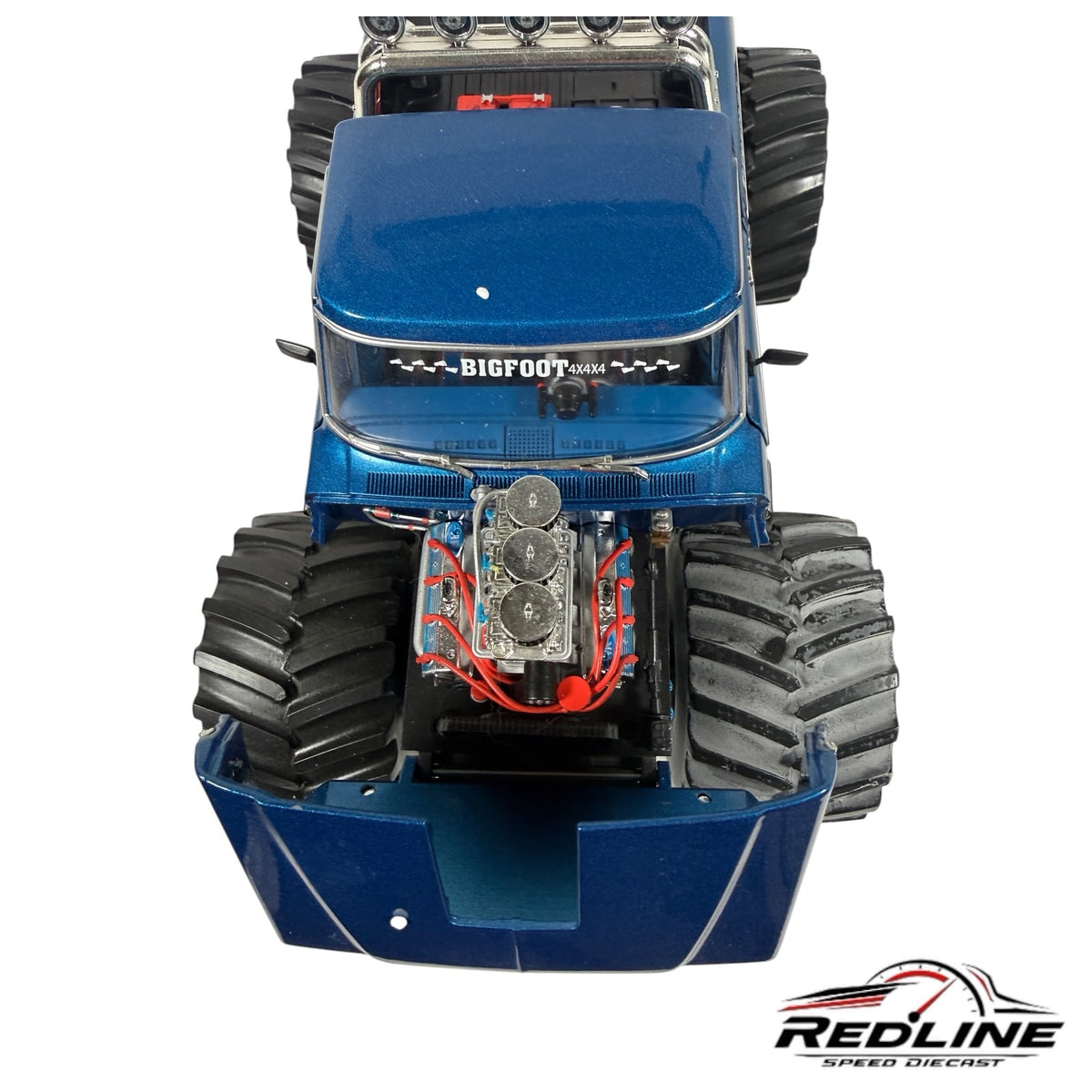 Bigfoot 1974 Ford F-250 monster truck diecast model in blue with detailed engine bay and oversized treaded tires.