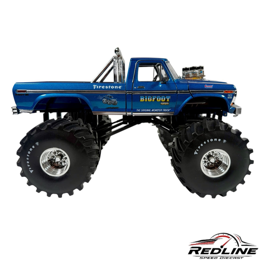 Blue 1974 Ford F-250 Bigfoot monster truck 1:18 scale diecast model with oversized Firestone tires and chrome roll bar.