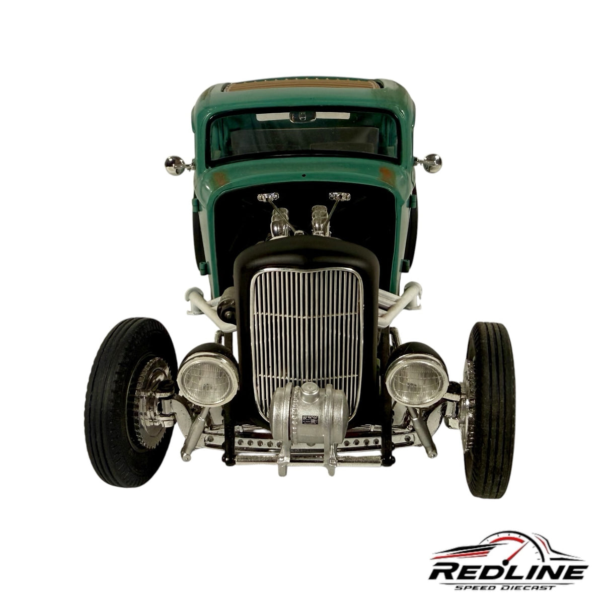 Front view of a green 1932 Ford hot rod diecast model featuring an exposed engine and vintage weathered finish.