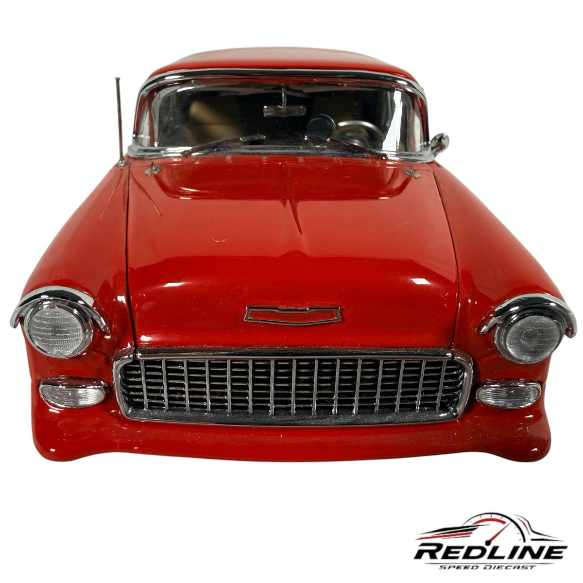 Redline Speed Diecast 1955 Nomad street machine model in glossy red with chrome grille and trim, front view.
