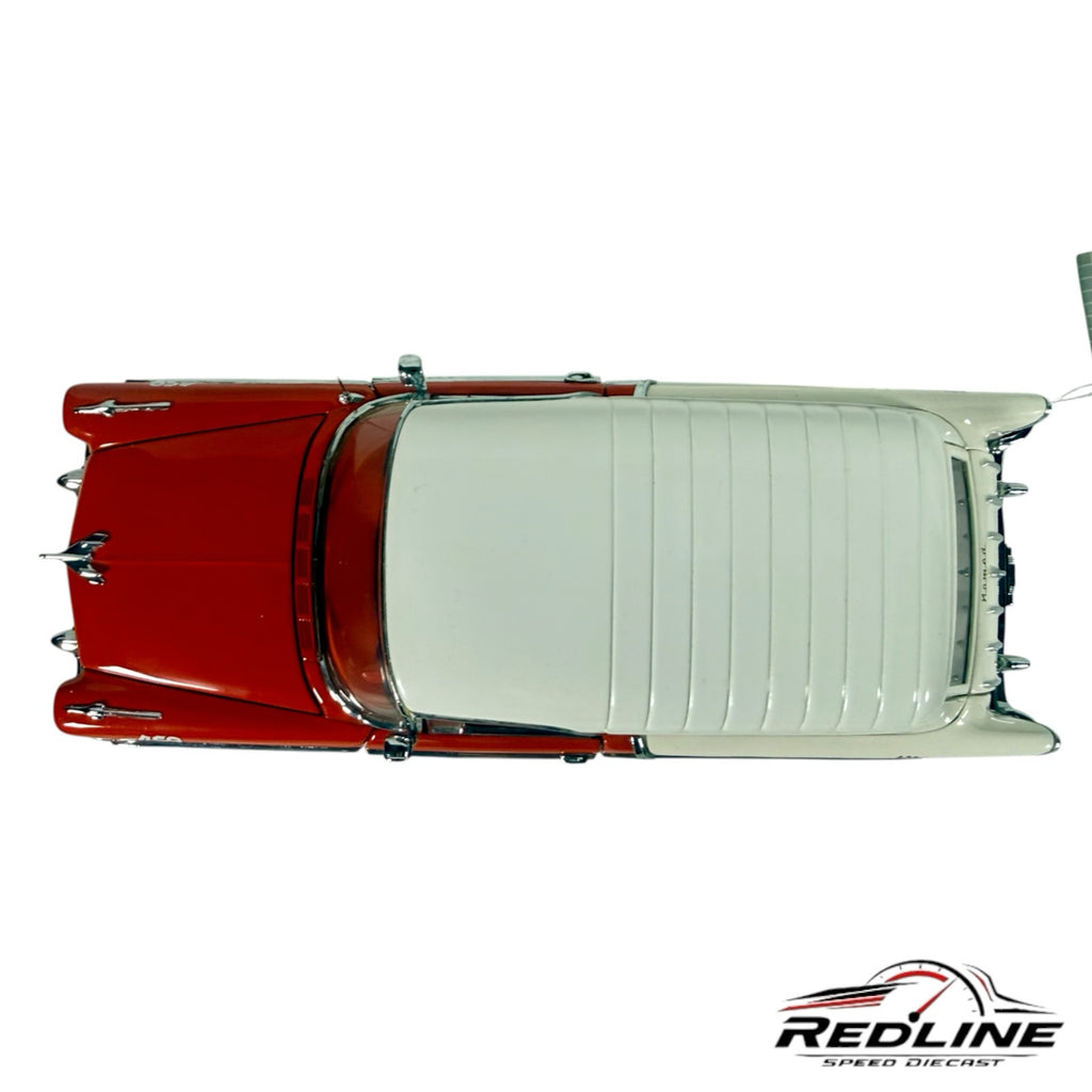 Redline Speed Diecast 1956 Chevrolet Nomad model in red and white with ribbed roof and chrome details, top view.