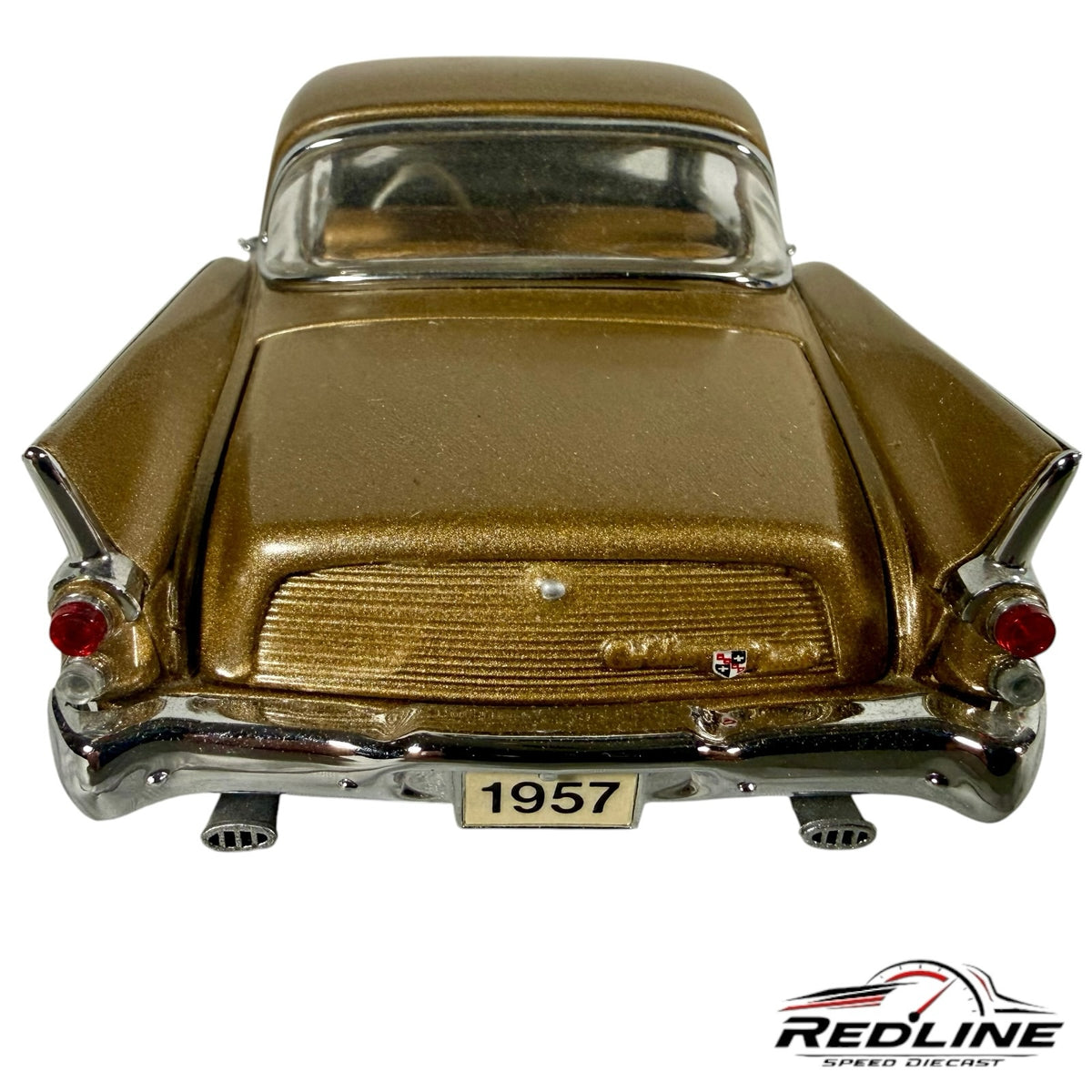 Redline Speed Diecast 1957 Studebaker Golden Hawk model car in metallic gold, rear view with chrome bumper and tail fins