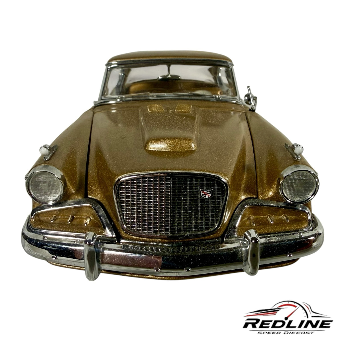 Redline Speed Diecast 1957 Studebaker Golden Hawk model car in metallic gold with chrome grille and front bumper