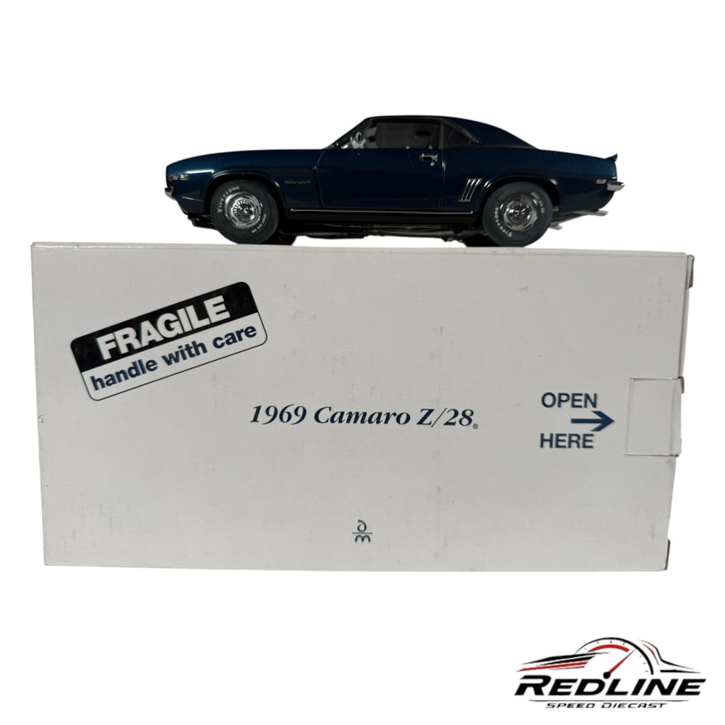 Redline Speed Diecast 1969 Chevrolet Camaro Z/28 dark blue muscle car model displayed on its original white box