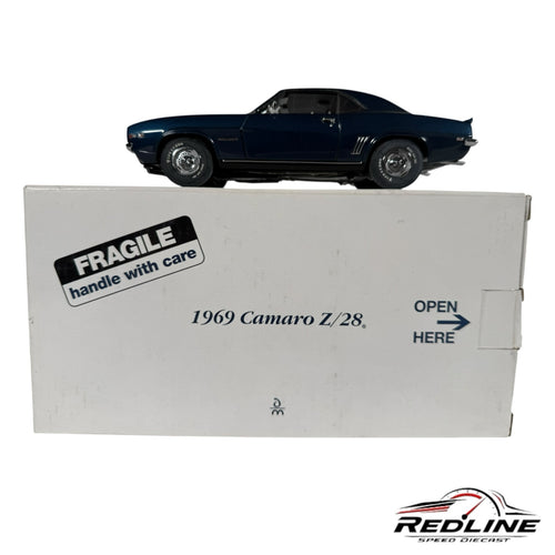 Redline Speed Diecast 1969 Chevrolet Camaro Z/28 dark blue muscle car model displayed on its original white box