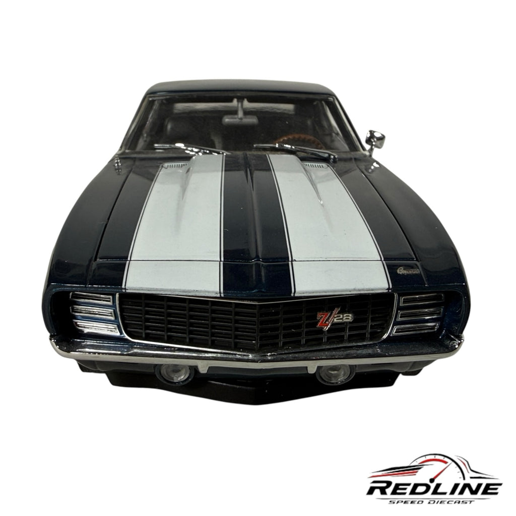 Redline Speed Diecast 1969 Chevrolet Camaro Z/28 model in dark blue with white racing stripes, front view
