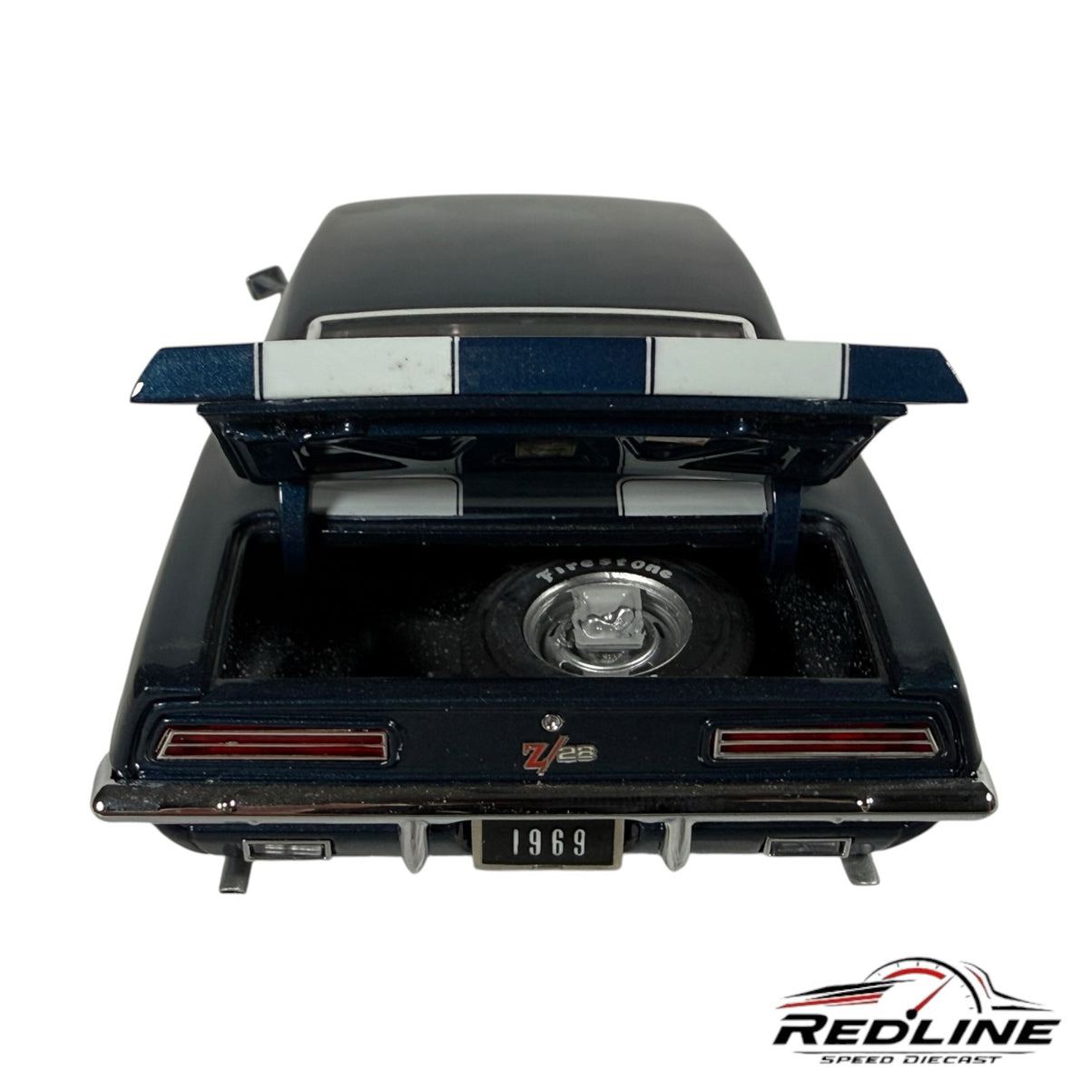 Redline Speed Diecast 1969 Chevrolet Camaro Z/28 model car in dark blue with open trunk and spare tire