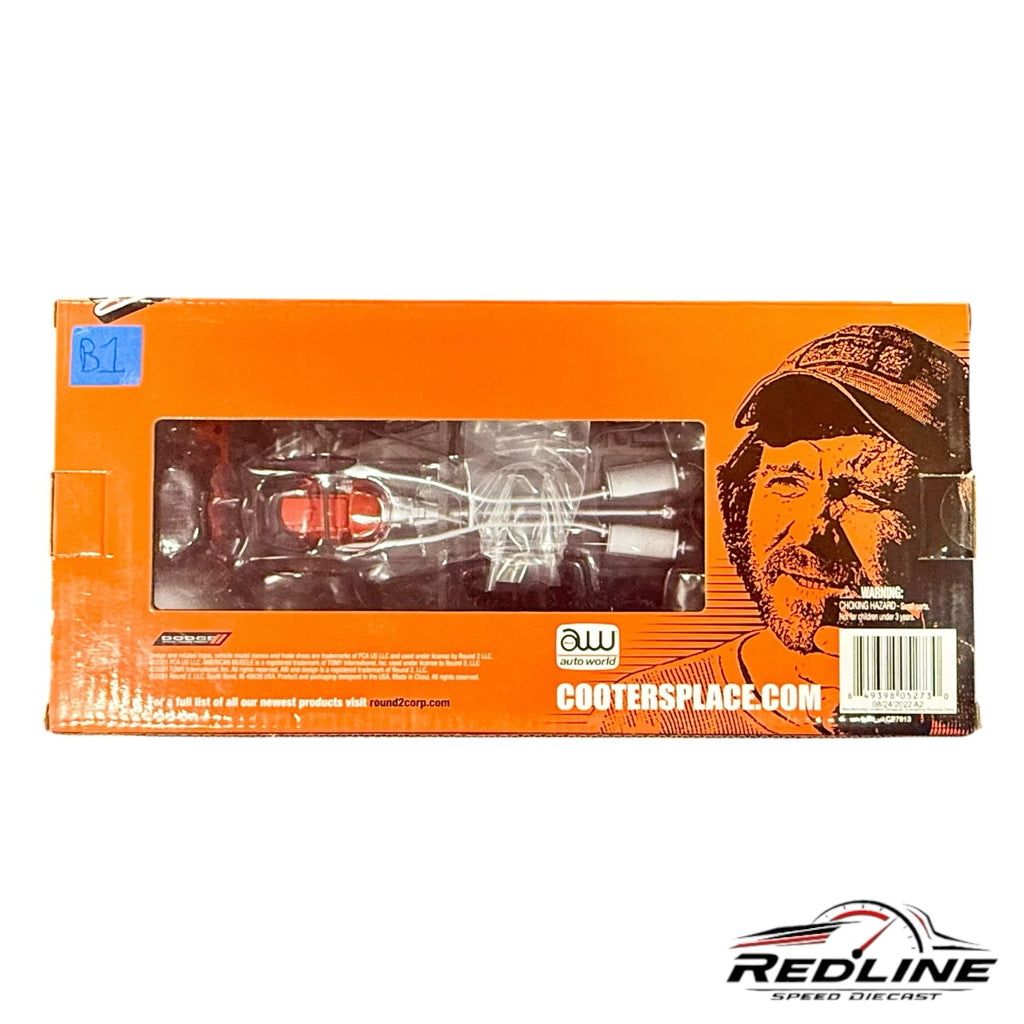 Redline Speed Diecast 1:18 scale 1969 Dodge Charger model in orange packaging featuring Cooter's Garage branding.