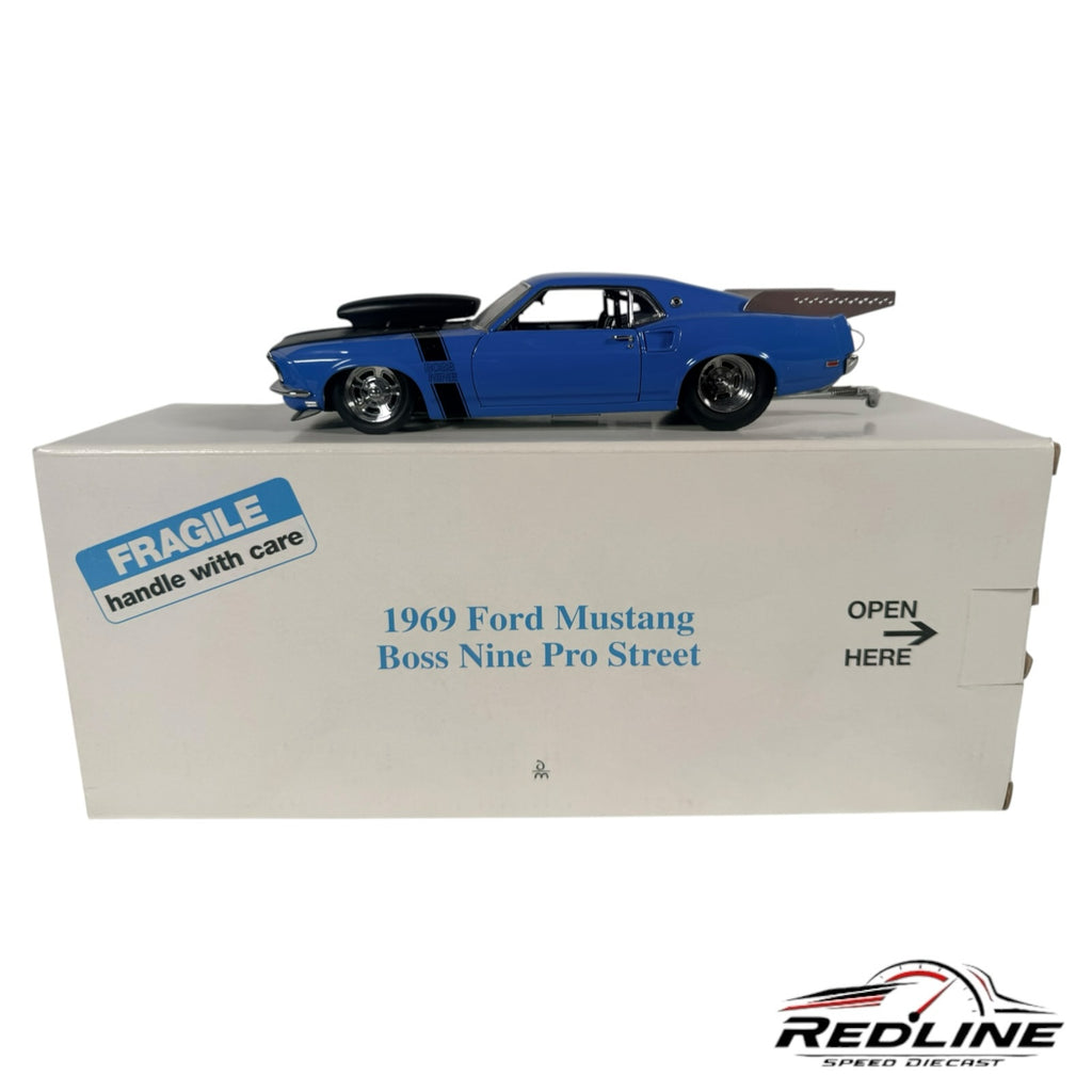Redline Speed Diecast 1969 Ford Mustang Boss Nine Pro Street model car in blue with black hood on white display box