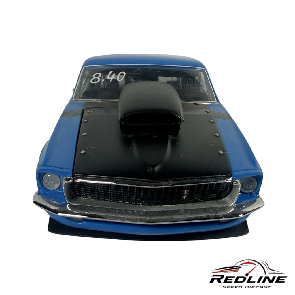 Redline Speed Diecast 1969 Ford Mustang Boss Nine Pro Street model in blue with a black hood and functional scoop