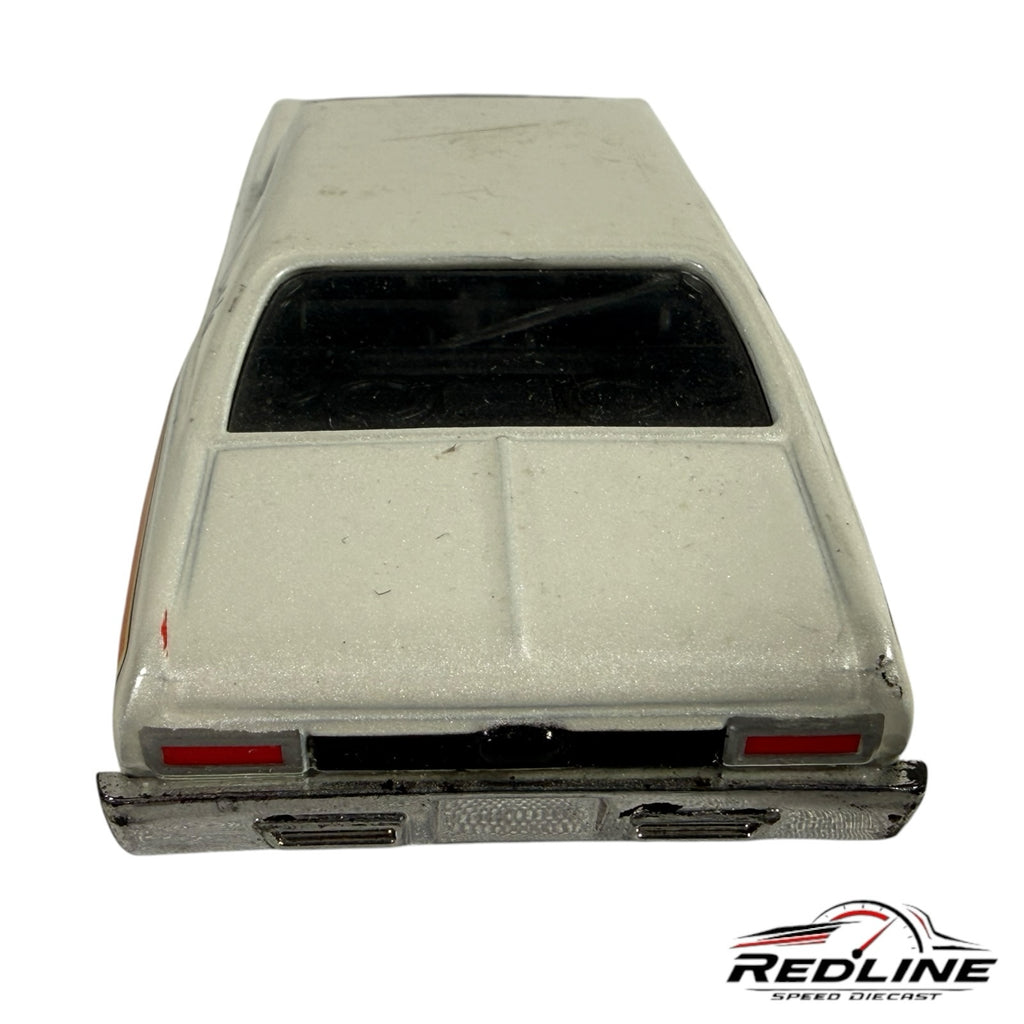 Rear view of a white 1970 Chevrolet Nova drag racing diecast car by Redline Speed Diecast with chrome bumper details.