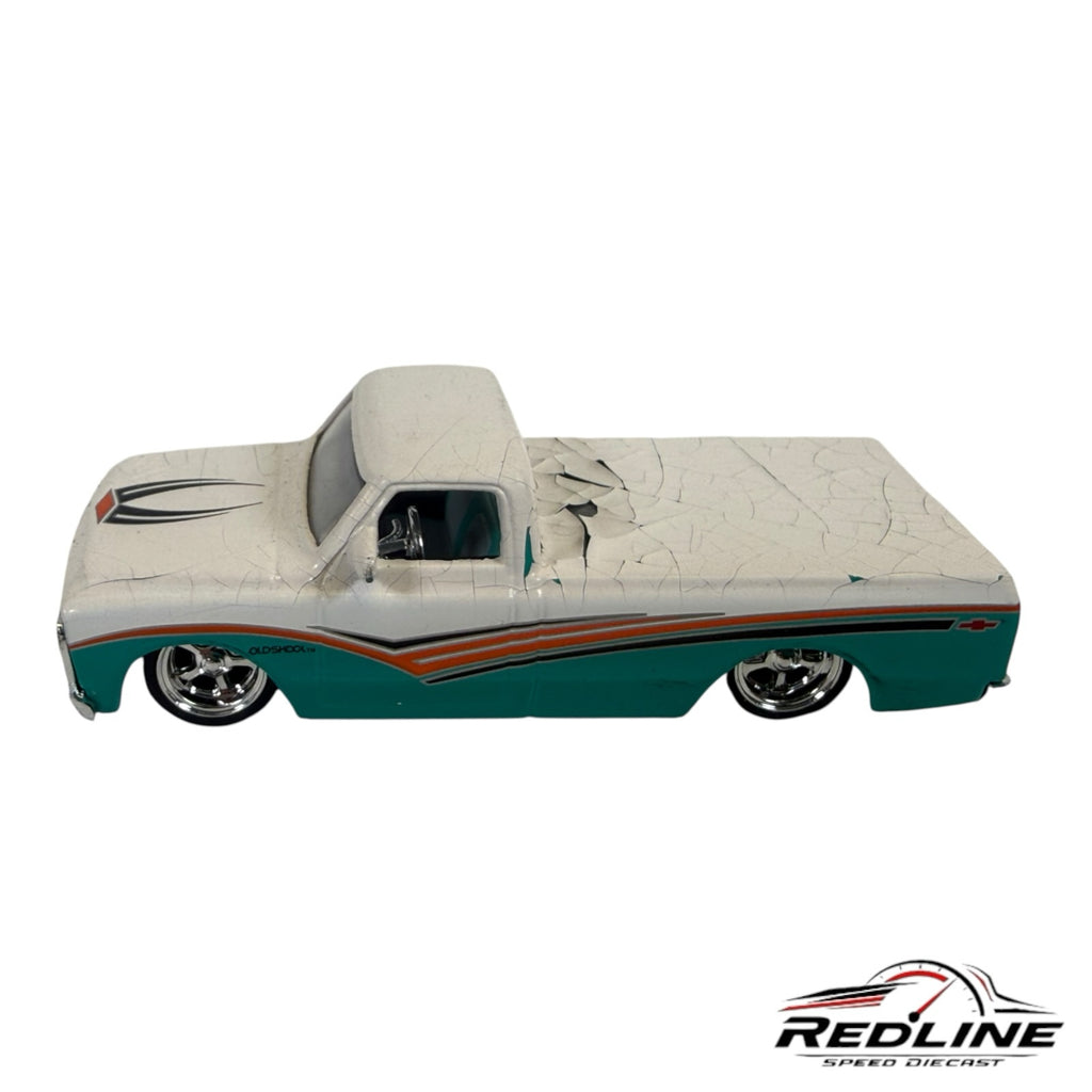 Redline Speed Diecast 1972 Chevrolet Cheyenne pickup model with a teal and white distressed crackle paint finish.