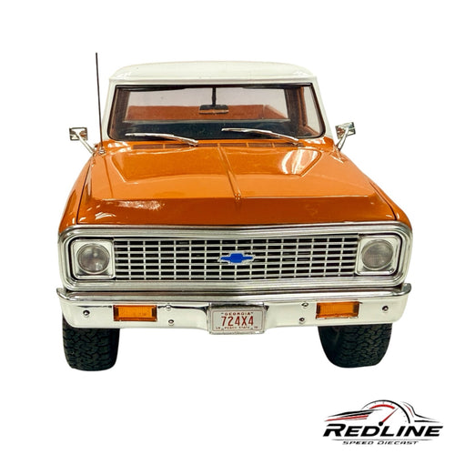 Redline Speed Diecast 1972 Chevrolet K-10 4x4 model in orange and white with chrome grille and front bumper