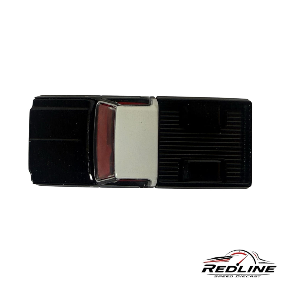 Redline Speed Diecast 1973 Chevrolet C10 pickup truck model in black and silver, top-down view