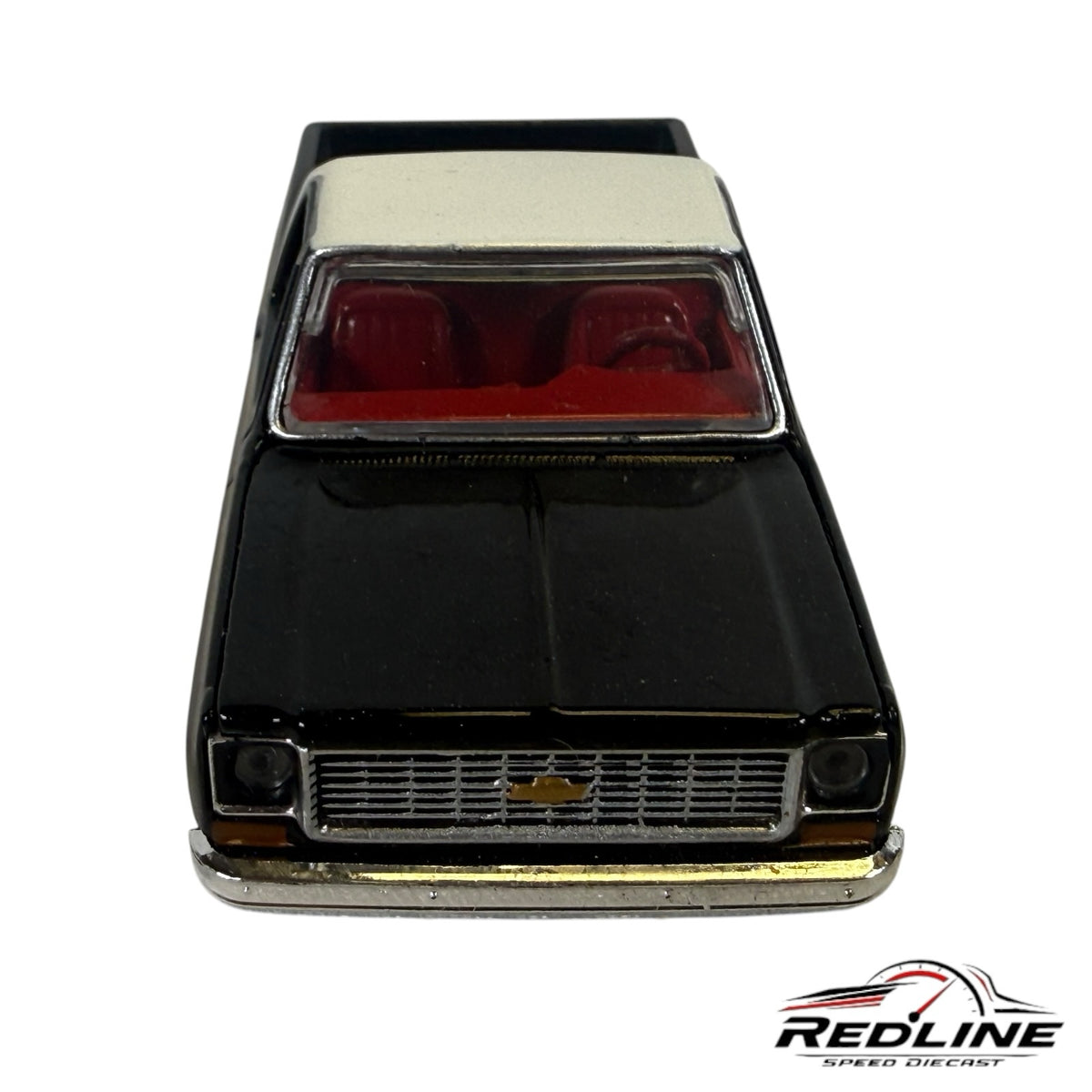 Redline Speed Diecast 1973 Chevrolet C10 truck model in black and silver with a detailed red interior