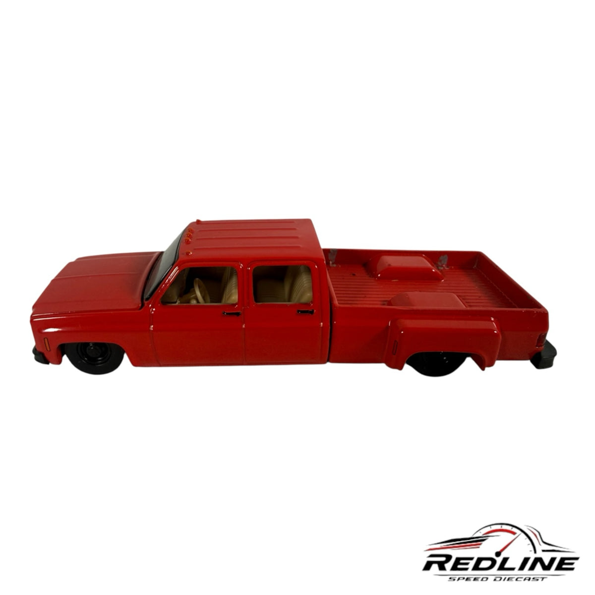 Redline Speed Diecast 1973 Chevrolet crew cab dually pickup truck model in glossy red with a tan interior
