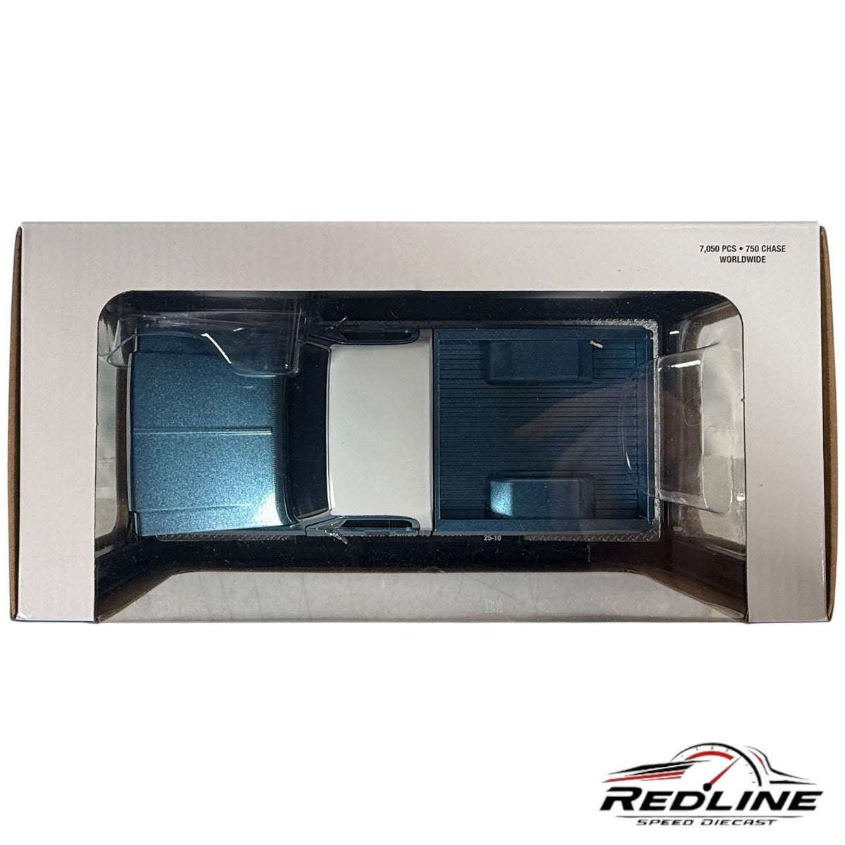 Redline Speed Diecast 1976 GMC Sierra Grande 15 pickup truck model in blue and white, viewed from above in packaging.