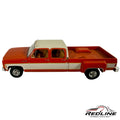 Redline Speed Diecast 1977 Chevrolet C30 crew cab dually pickup truck model in two-tone orange and white