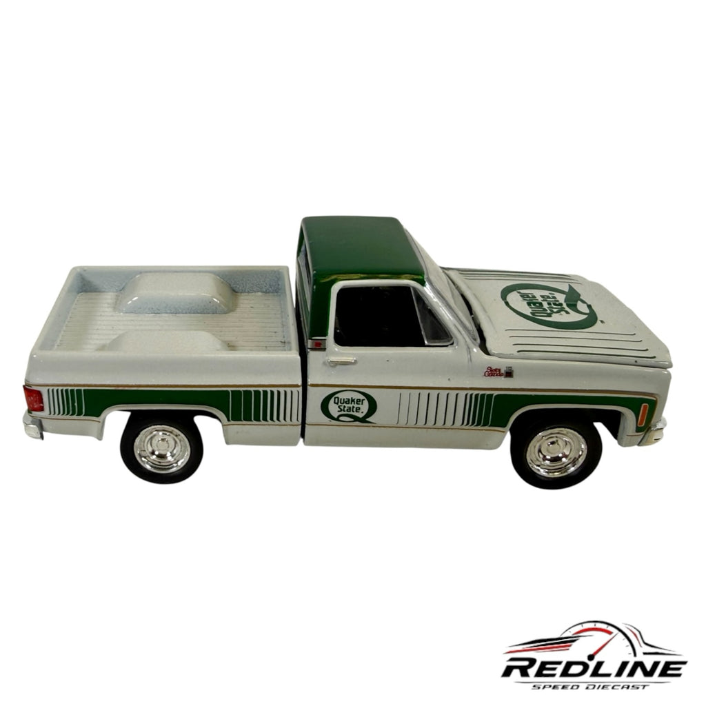 Redline Speed Diecast 1977 GMC Sierra Grande pickup truck model in white and green with Quaker State branding