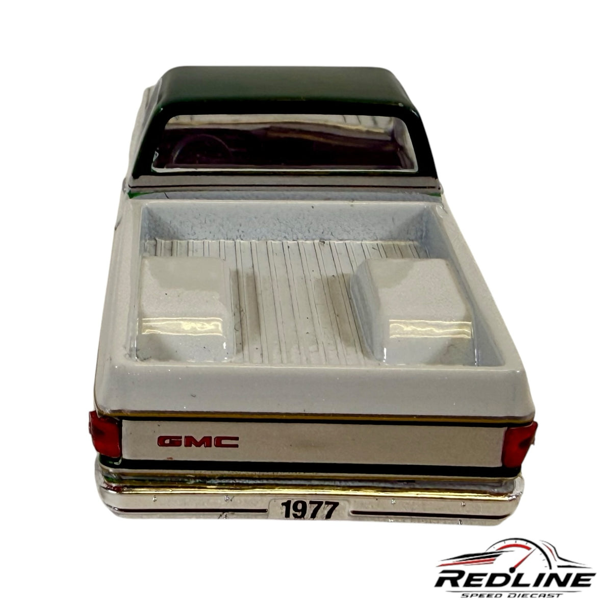 Redline Speed Diecast 1977 GMC Sierra Grande model truck in white and green, rear view showing truck bed and tailgate.