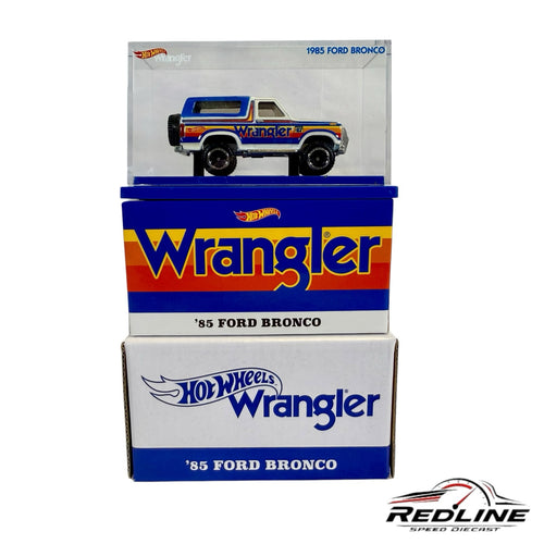 Redline Speed Diecast Hot Wheels 1985 Ford Bronco in blue and white with Wrangler branding and display packaging.