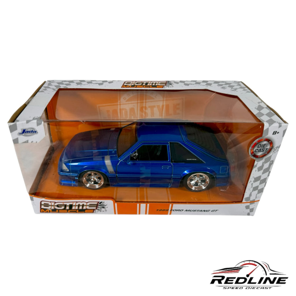 Redline Speed Diecast 1989 Ford Mustang GT model in deep blue with chrome wheels inside its original display box