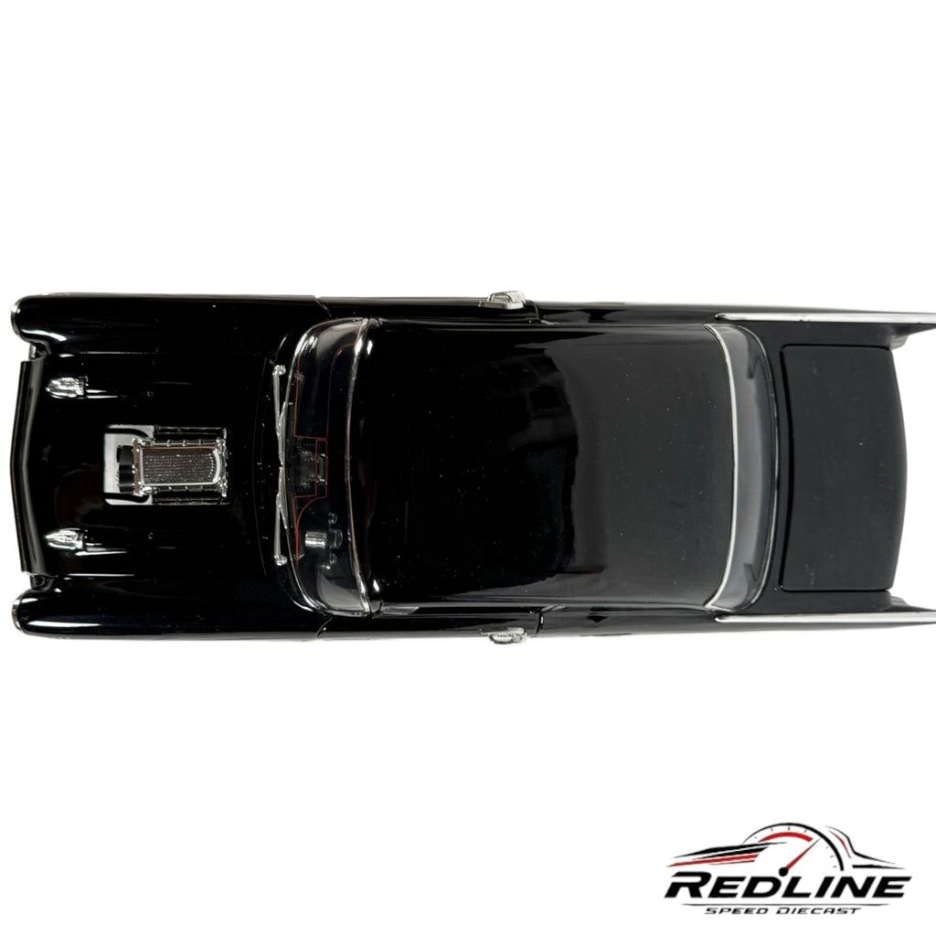 Top-down view of a Redline Speed Diecast 1957 Chevrolet Bel Air Gasser model in glossy black with chrome blower.