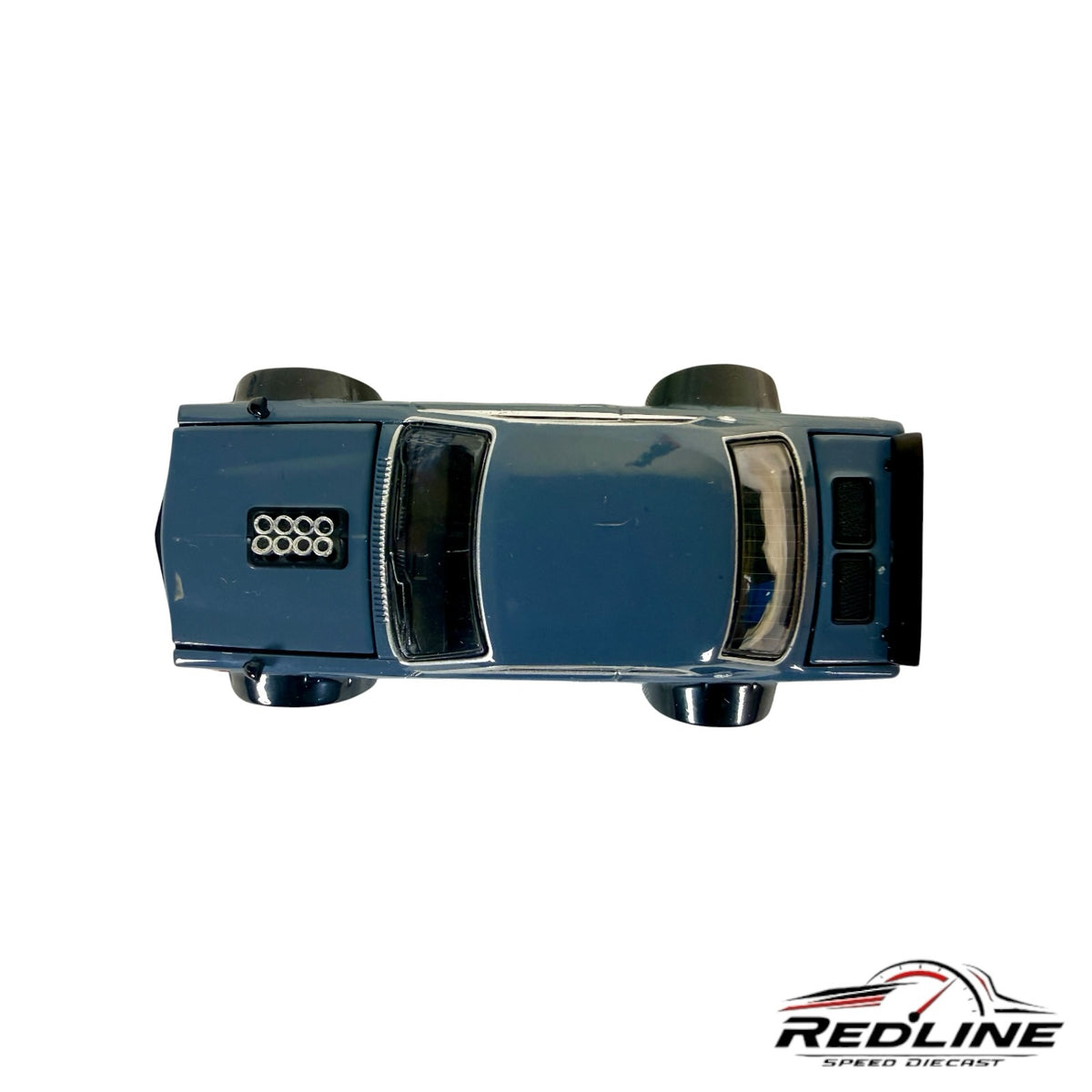 Top view of a Redline Speed Diecast blue Skyline GT-R V8 drift model car with wide-body stance and hood engine detail.
