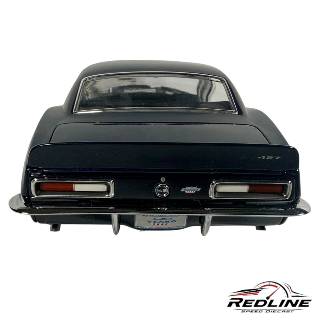 Rear view of a Redline Speed Diecast 1:18 scale metallic blue Chevrolet Yenko Camaro model with chrome bumper details