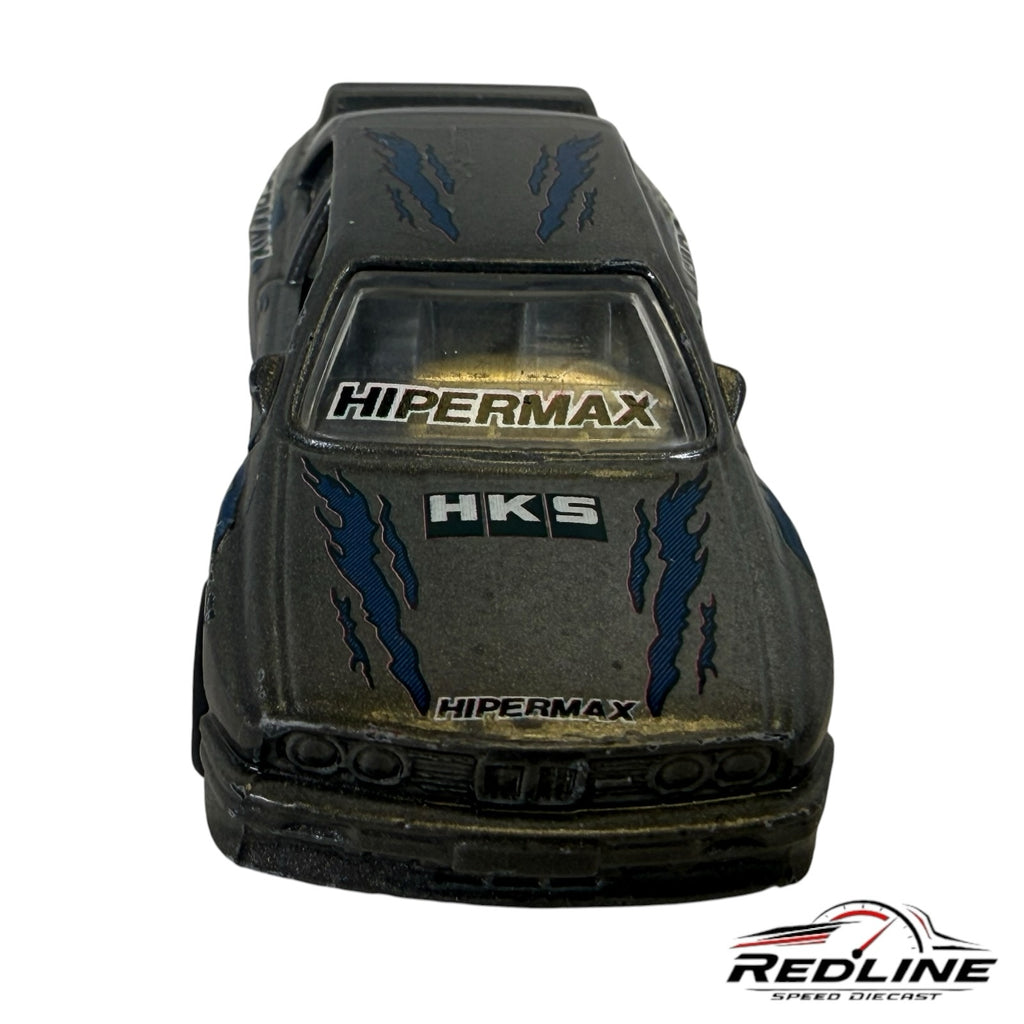 Redline Speed Diecast metallic grey BMW E30 M3 tuner model with blue flame decals and HKS branding