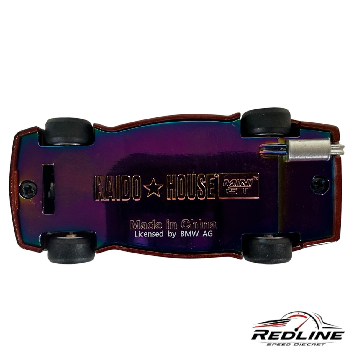 Redline Speed Diecast BMW M3 Kaido GT V1 model car showing the iridescent oil-slick chassis and black rubber tires.