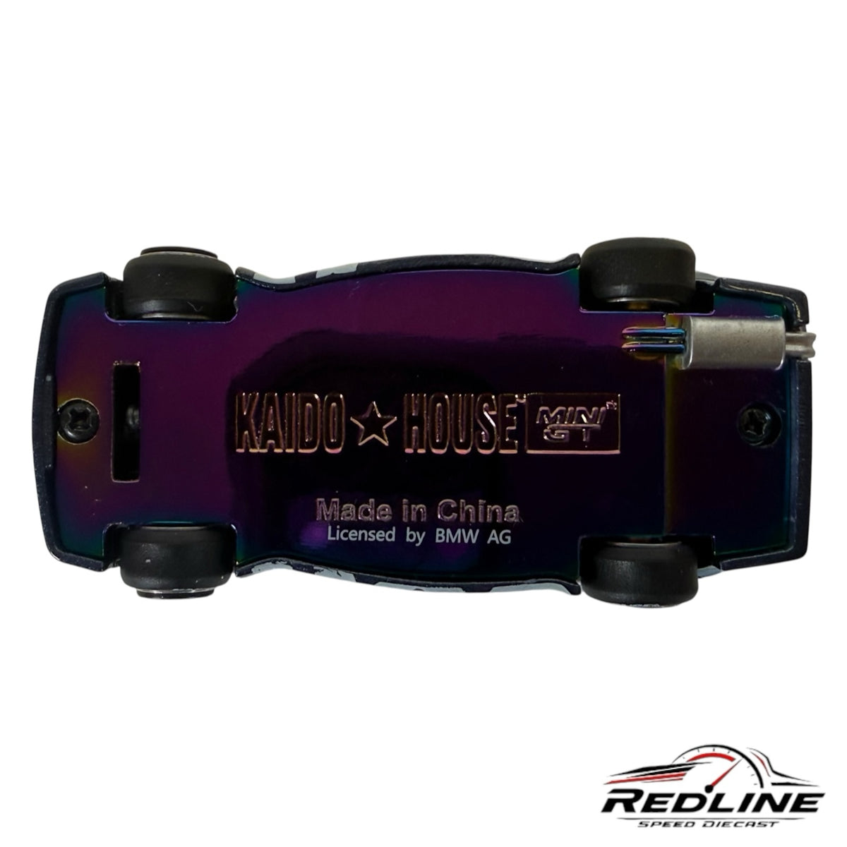 Underside of Redline Speed Diecast BMW M3 model car featuring a metallic iridescent finish and Kaido House branding.