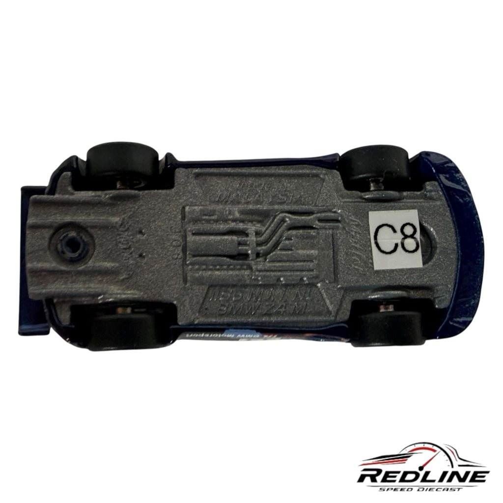 Underside view of a Redline Speed Diecast BMW Z4 M Coupe toy car showing the metal chassis and exhaust detail