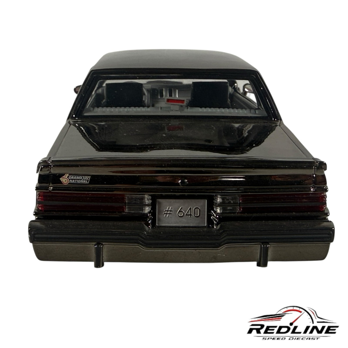 Rear view of a black Redline Speed Diecast 1987 Buick Grand National 1:18 scale model car with detailed taillights.