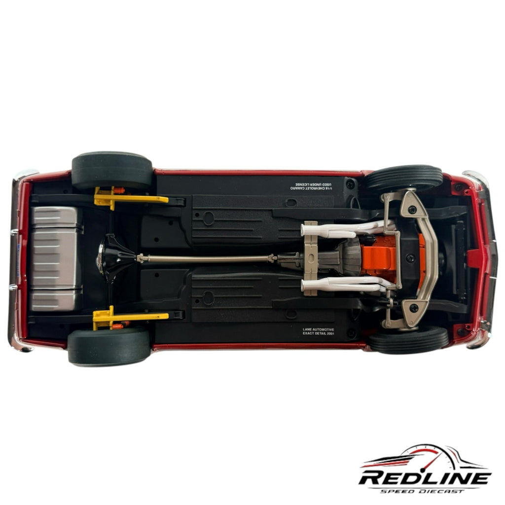 Undercarriage view of a Redline Speed Diecast 1967 Chevrolet Camaro SS 396 model showing detailed chassis components.