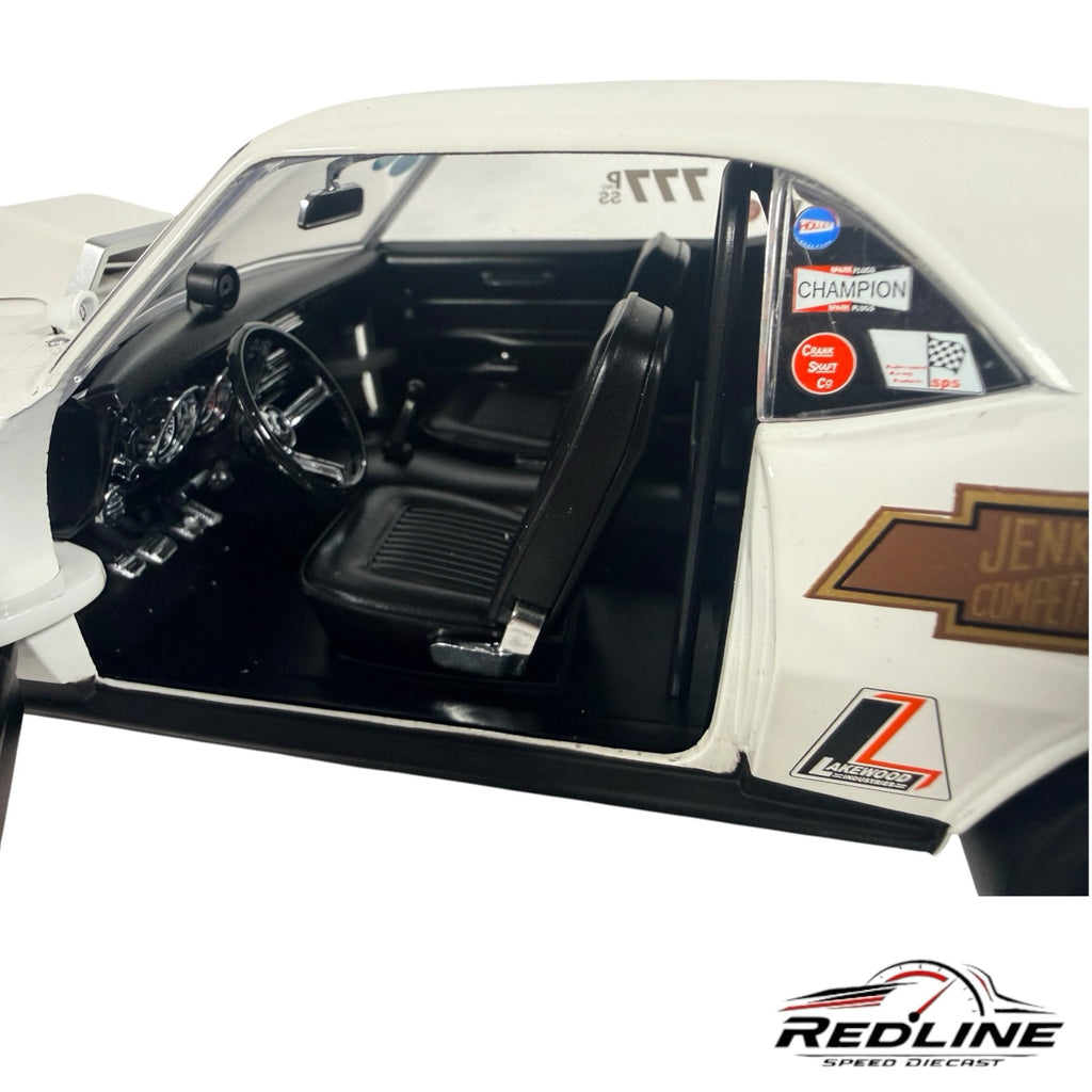 Redline Speed Diecast 1:18 scale Grumpy's Toy Chevrolet Camaro model showing detailed black interior and racing decals