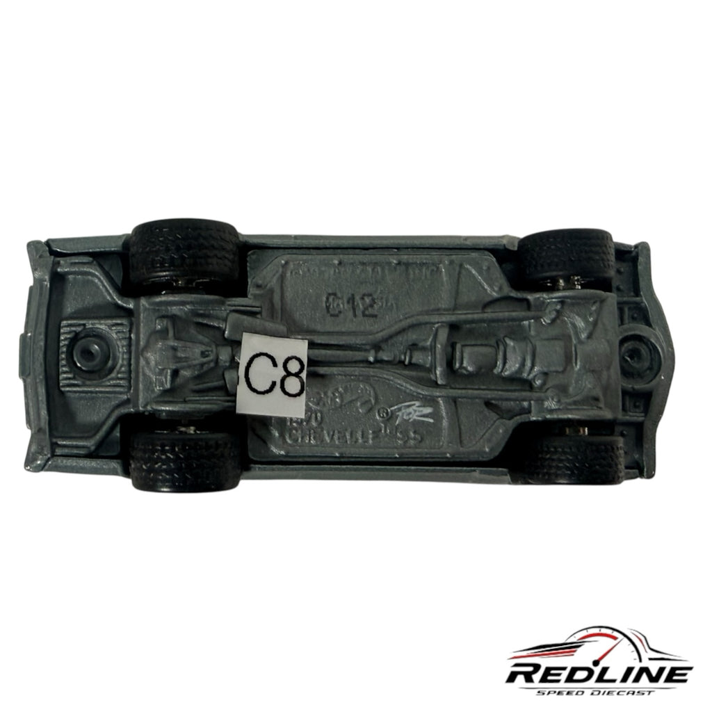 Underside view of a metallic grey Redline Speed Diecast 1970 Chevrolet Chevelle SS model car showing chassis details