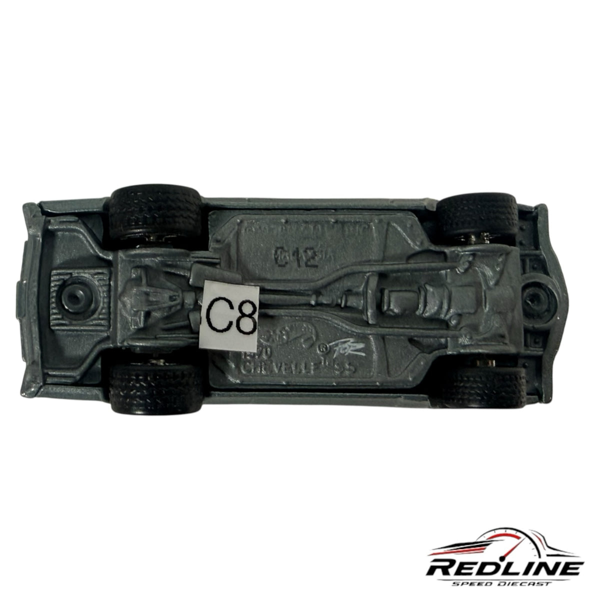 Underside view of a metallic grey Redline Speed Diecast 1970 Chevrolet Chevelle SS model car showing chassis details