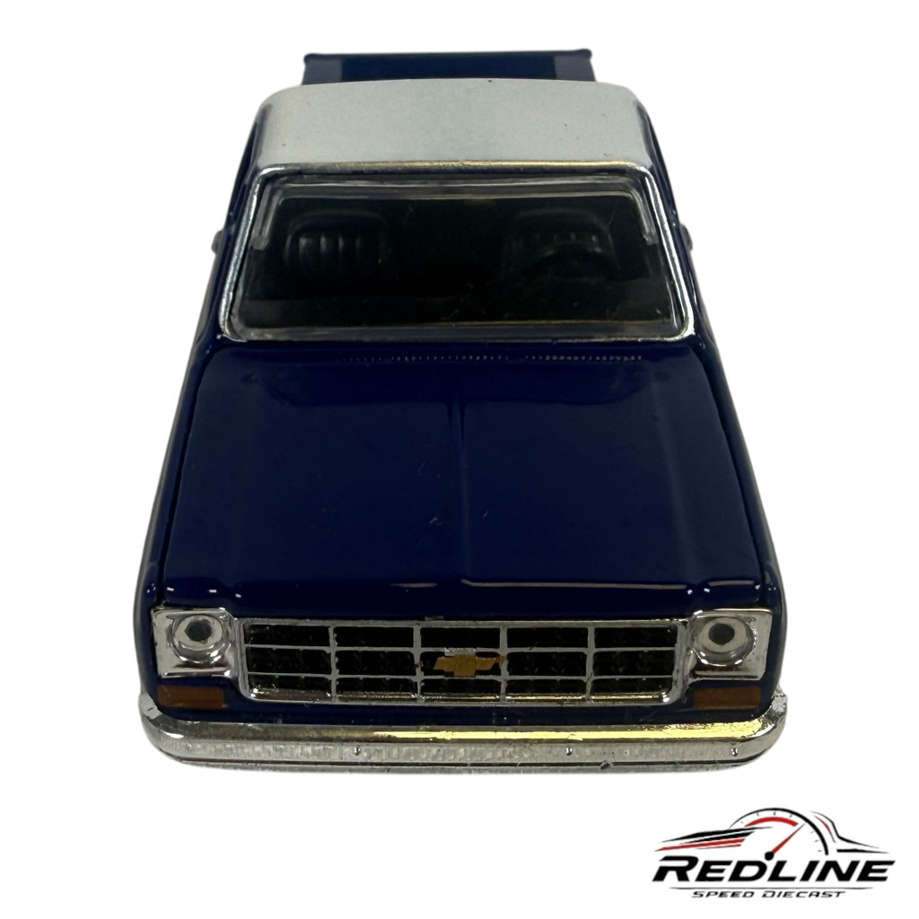 Redline Speed Diecast 1979 Chevrolet C10 pickup truck model in deep blue and silver, front view.