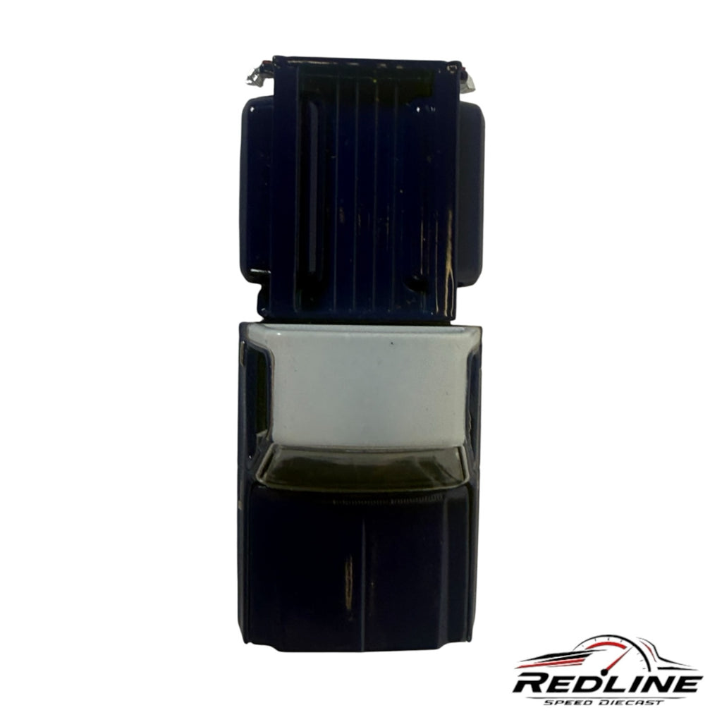 Redline Speed Diecast 1979 Chevrolet C10 pickup model in deep blue and silver, top-down view.