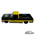 Redline Speed Diecast 1974 Chevrolet C10 pickup truck model in black and yellow with MOON Equipped branding