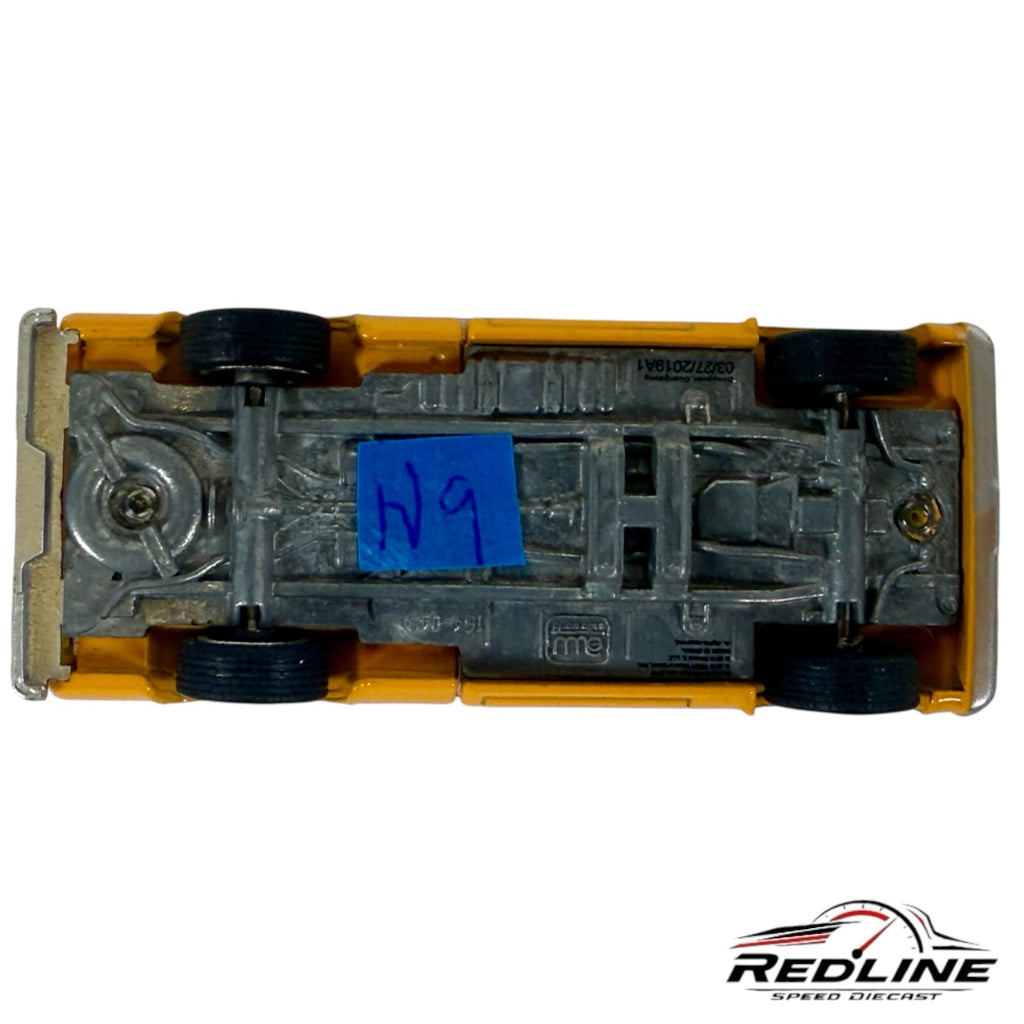Underside view of a Redline Speed Diecast Chevrolet Cheyenne pickup truck model showing metal chassis and wheels