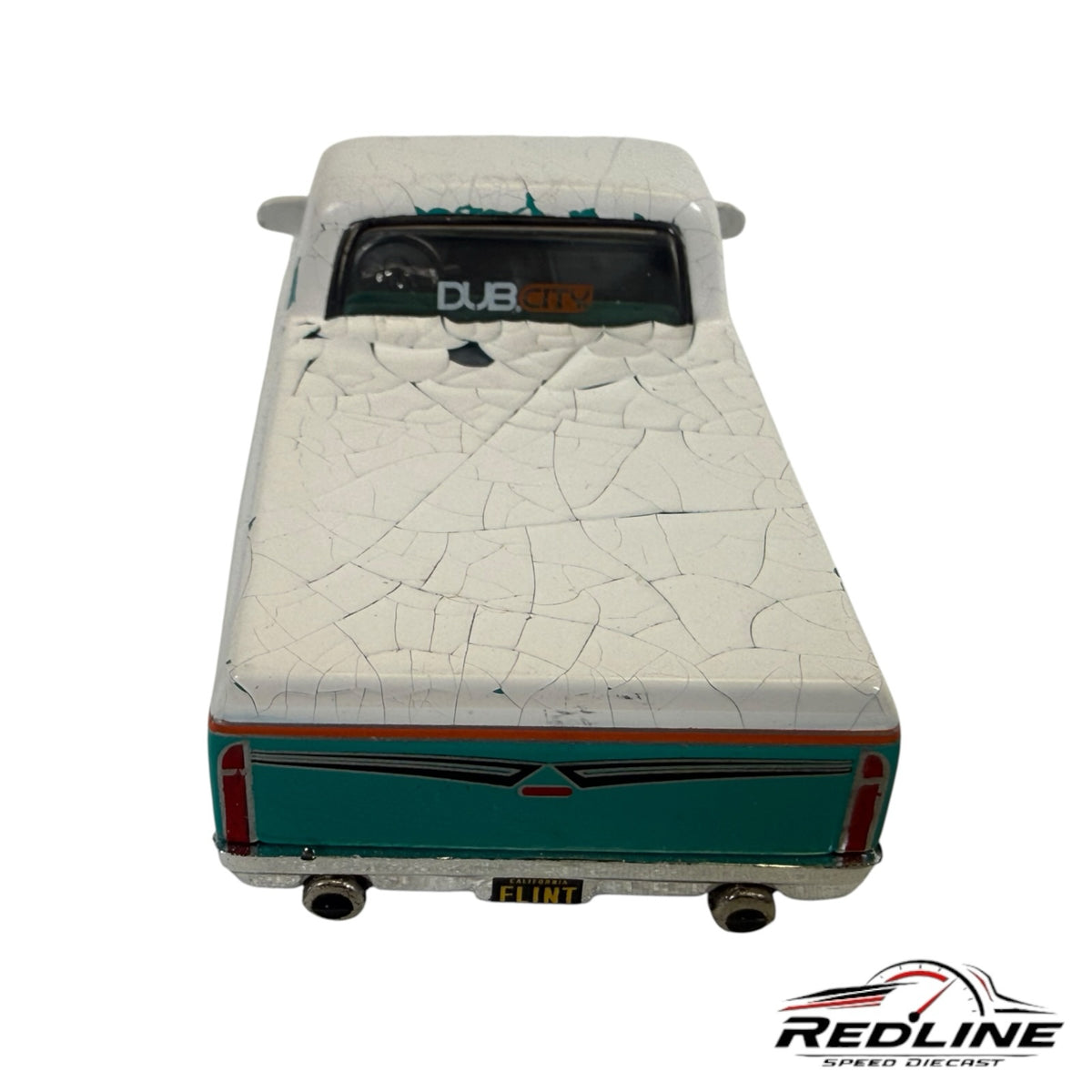 Redline Speed Diecast 1972 Chevrolet Cheyenne pickup model featuring a white crackle paint finish and teal accents.