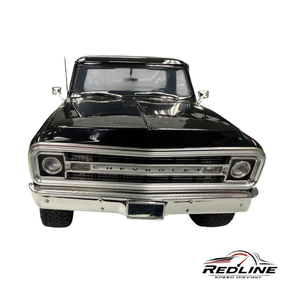 Redline Speed Diecast 1970 Chevrolet K-10 4x4 model in high-gloss black with chrome grille and front bumper