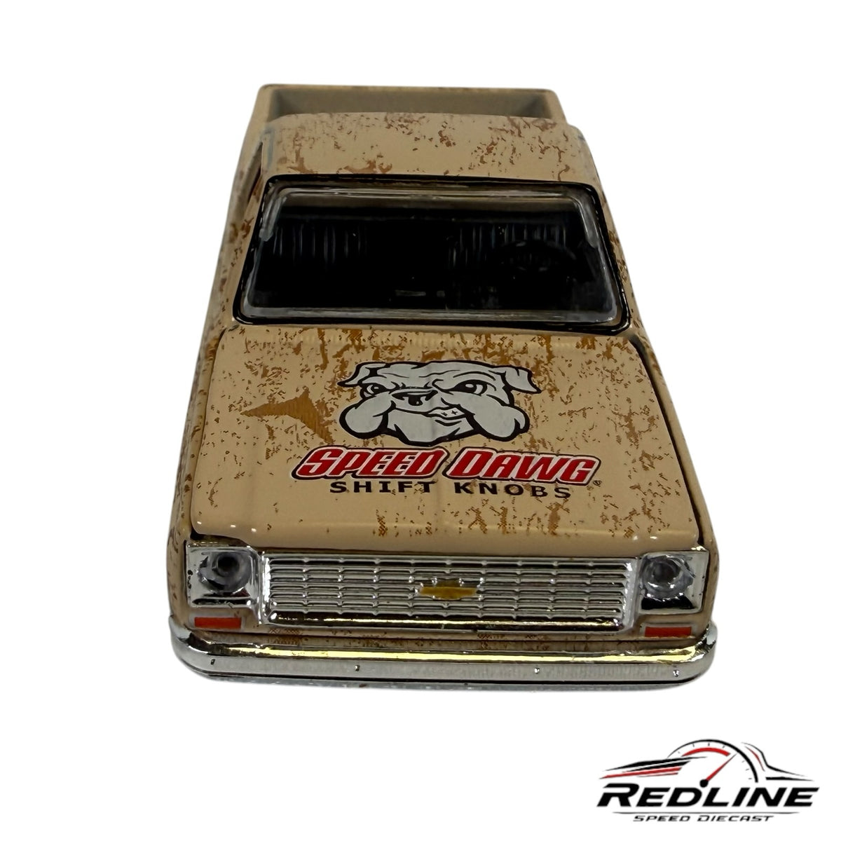 Redline Speed Diecast 1973 Chevrolet pickup truck model with a weathered tan finish and Speed Dawg bulldog hood graphic