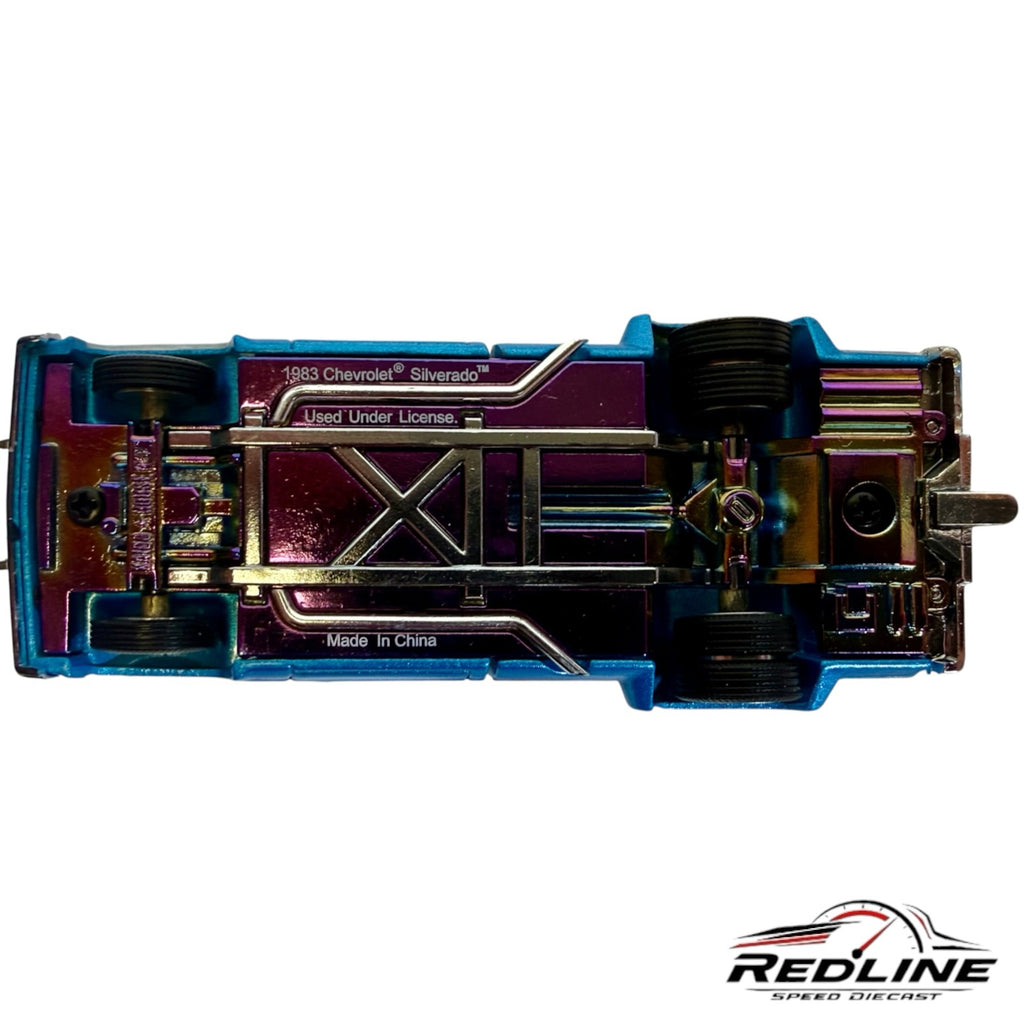 Redline Speed Diecast 1983 Chevrolet Silverado Dually model showing the detailed purple metallic chassis underside