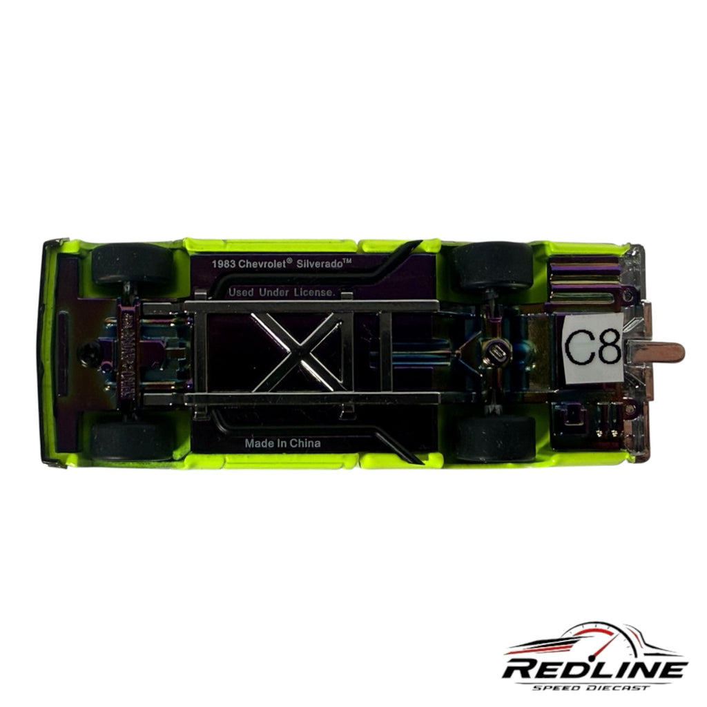 Redline Speed Diecast 1:64 scale 1983 Chevrolet Silverado model truck chassis view with iridescent metal finish