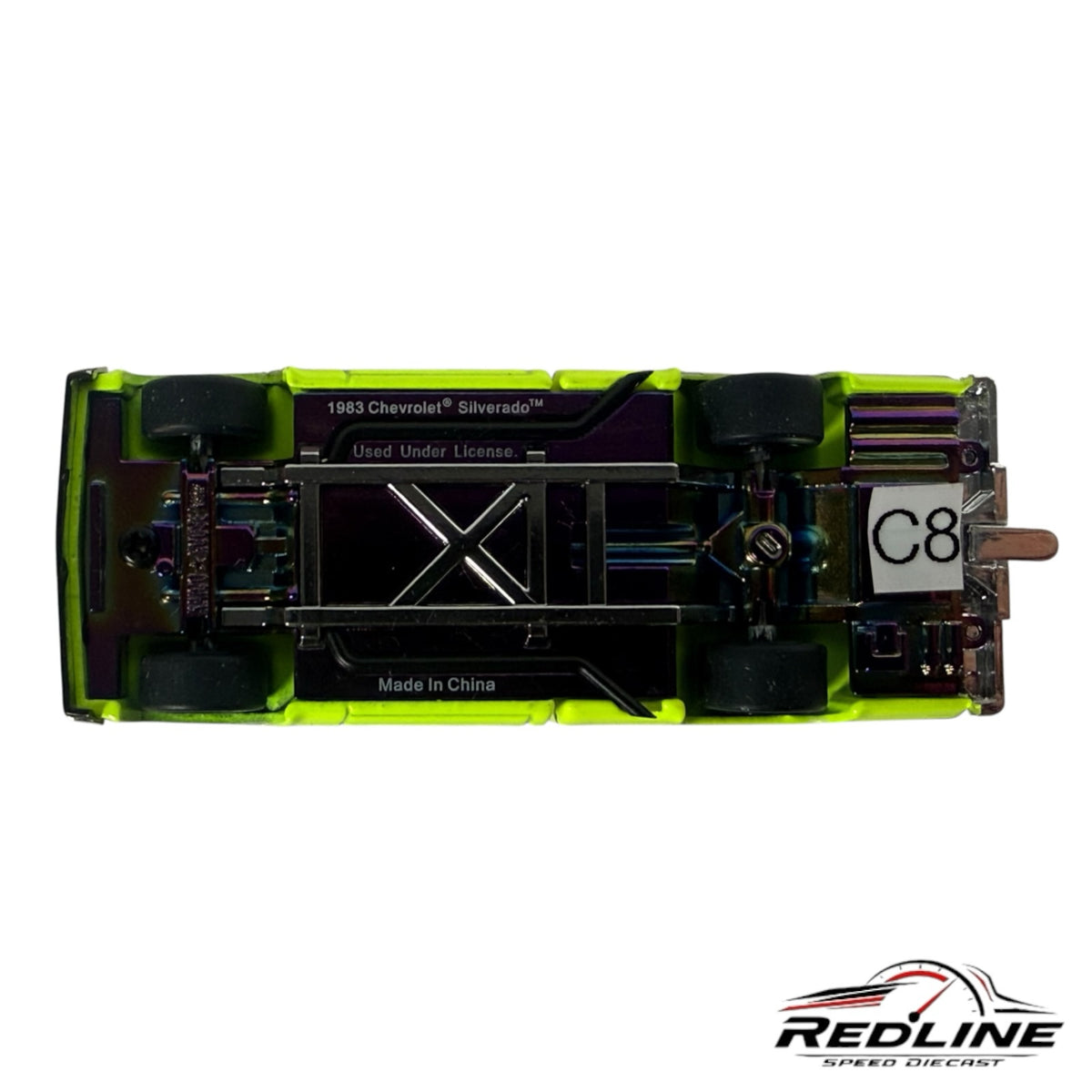 Redline Speed Diecast 1:64 scale 1983 Chevrolet Silverado model truck chassis view with iridescent metal finish