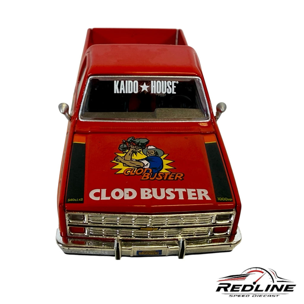 Redline Speed Diecast Kaido House Tamiya Chevrolet Silverado Clod Buster diecast truck with red paint and graphics.